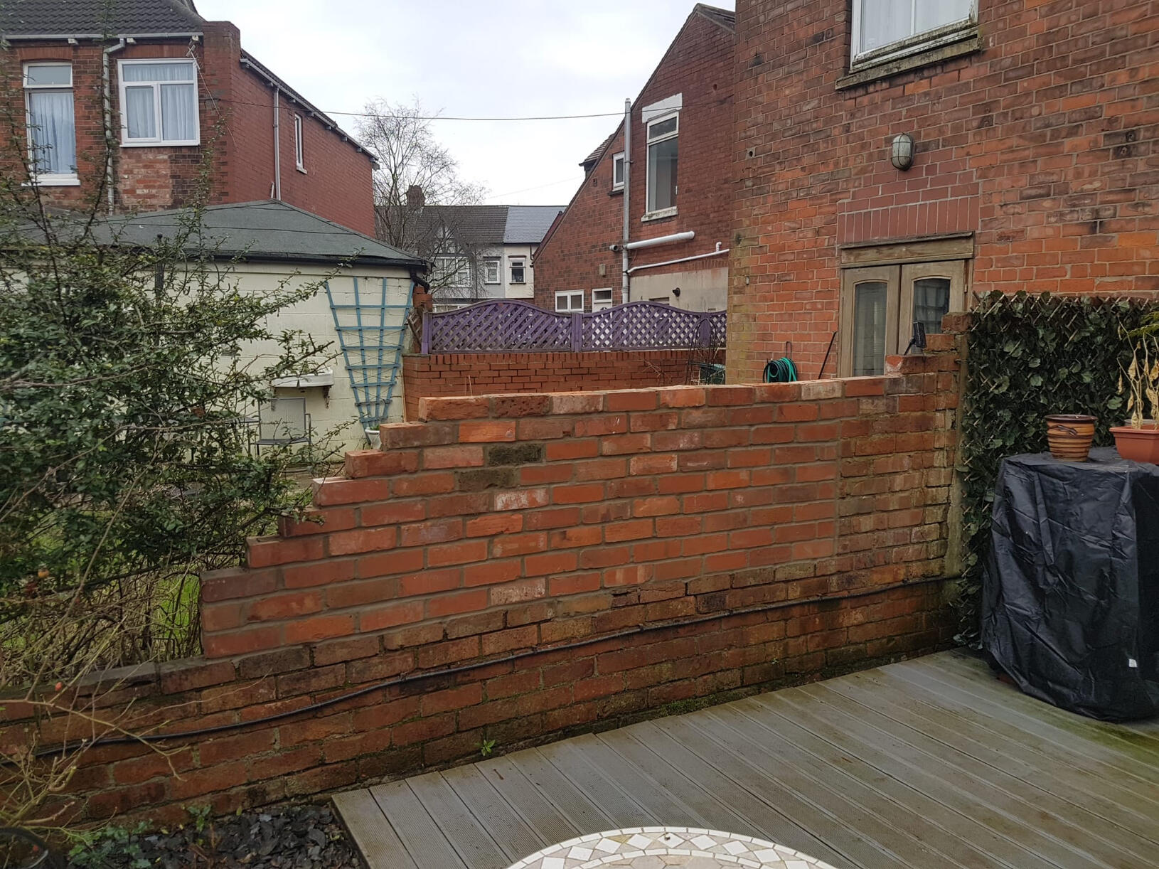 Rebuilding a brick wall.